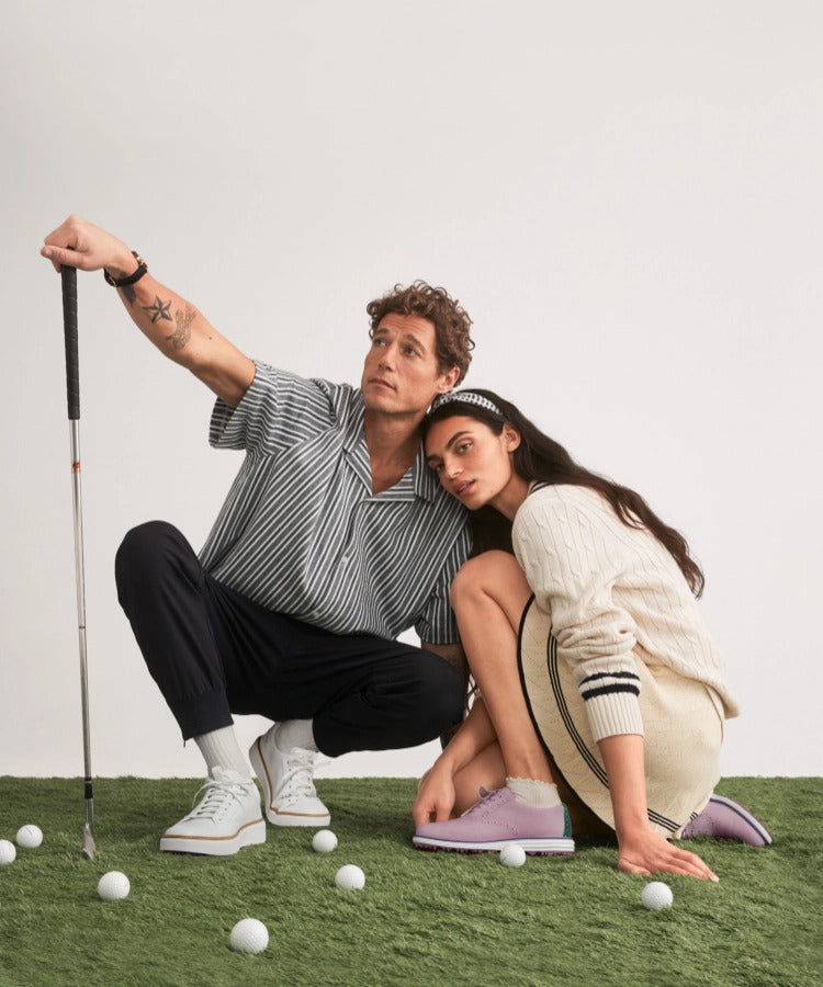 Woman standing wearing blue oxfords