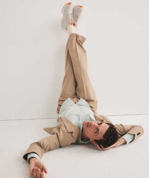 Woman standing wearing blue oxfords